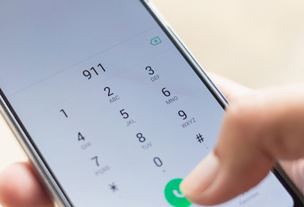 dialing 911 on smartphone screen